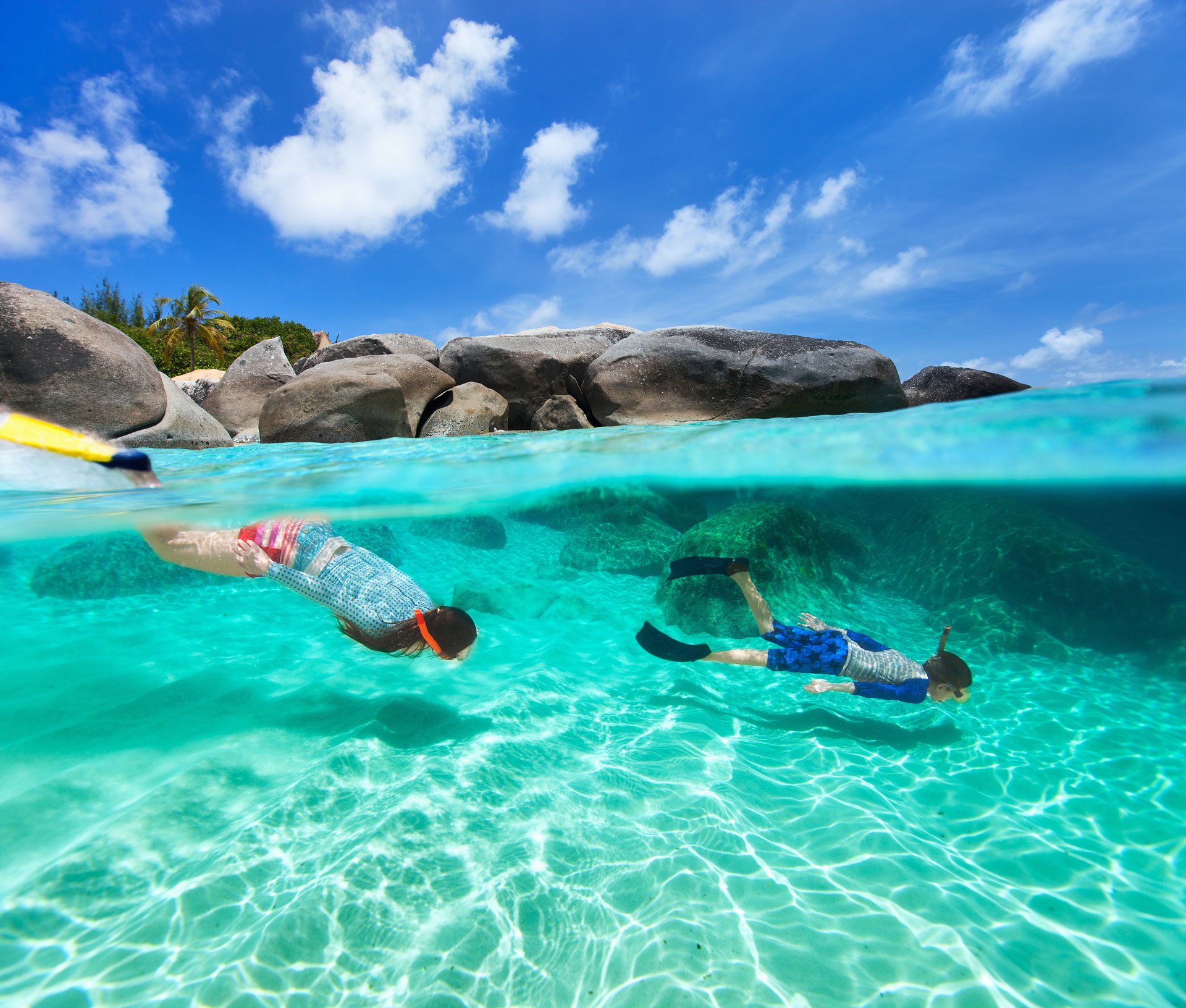 Family Snorkeling in Tropical Beach